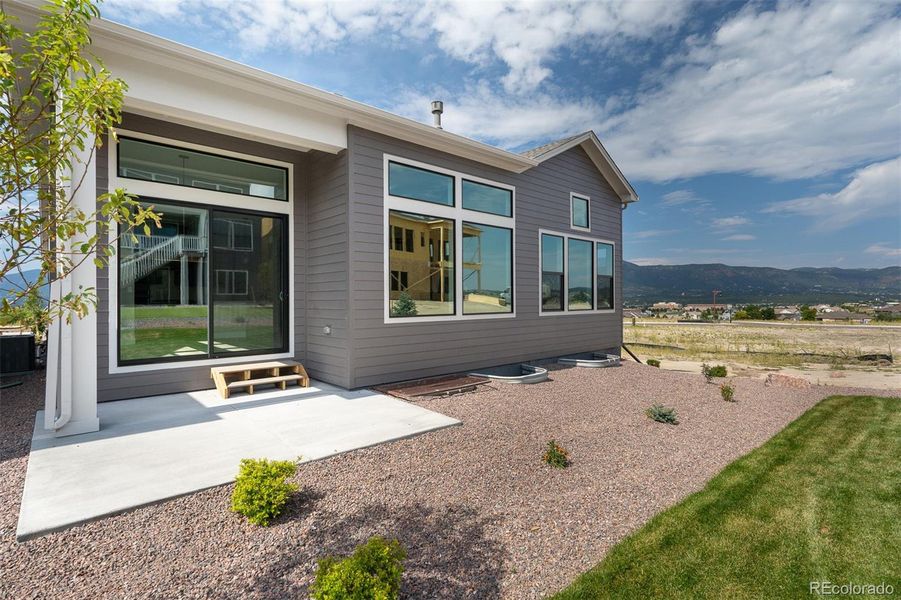 Exterior details and patio area of a home in Cloverleaf – Mountainview Collection, Monument (Image 1).