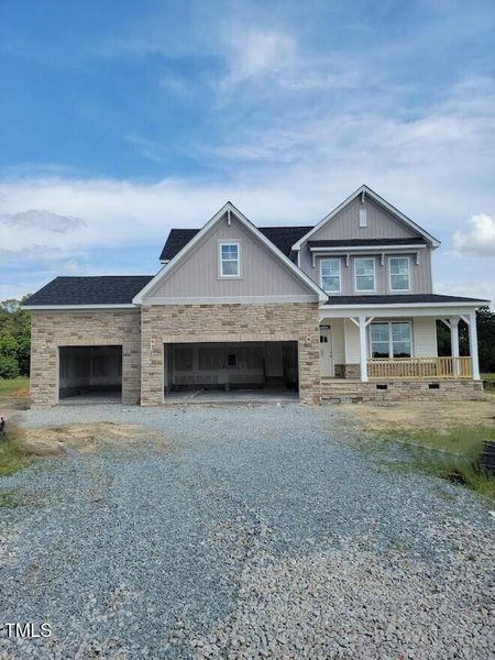 Front exterior of a new home in Tobacco Road, Angier, NC, highlighting curb appeal (Image 60). Front exterior of a new home in Tobacco Road, Angier, NC, highlighting curb appeal (Image 60).