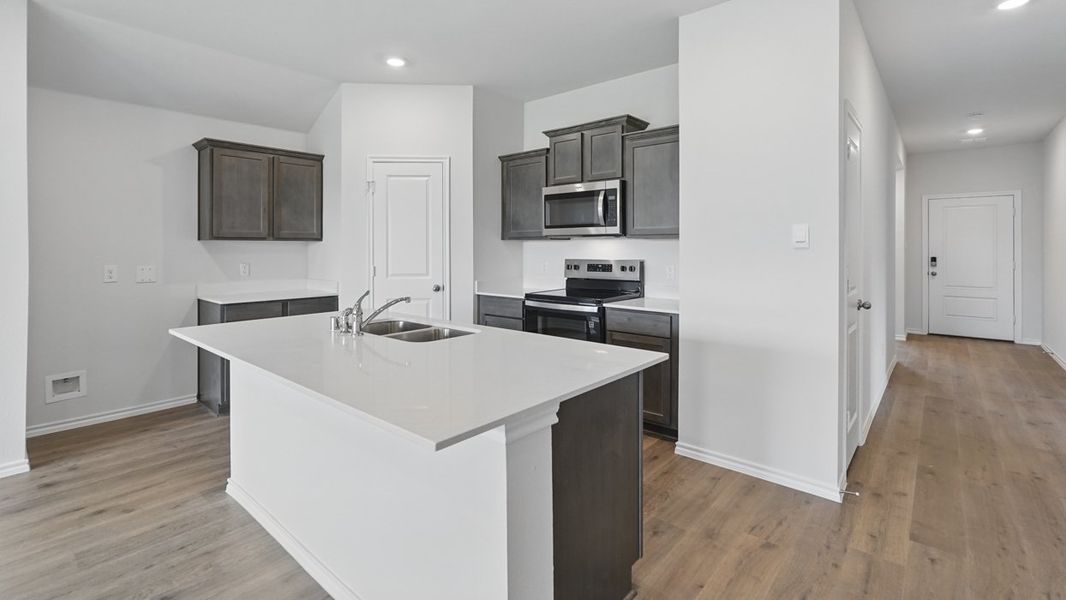 Furnished interior view inside a new home in Crane Crossing, Crandall (Image 4).