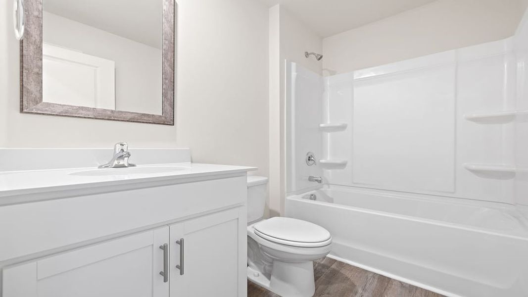 Furnished interior view inside a new home in Lakestone, Woodruff (Image 3).