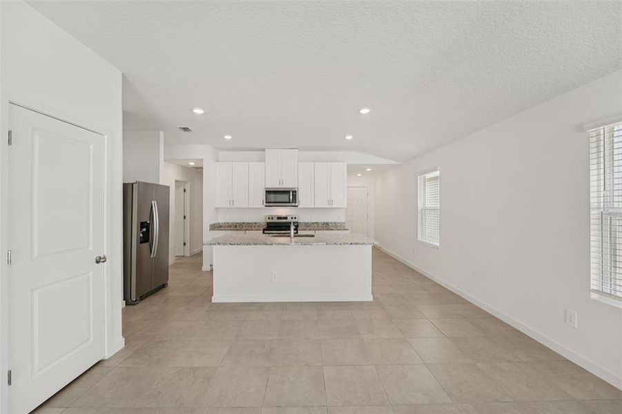Spacious, unfurnished interior of a new home in Flagler Village - Classic Series, Palm Coast (Image 31).