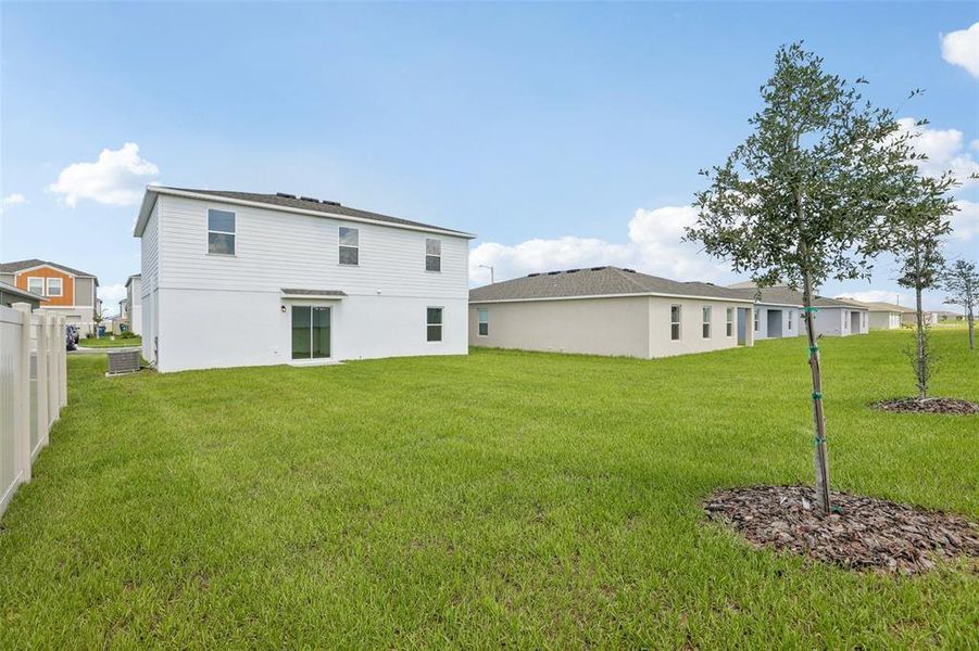 Exterior details and patio area of a home in The Grove at Scenic Terrace, Lake Hamilton (Image 3).