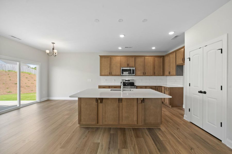 Furnished interior view inside a new home in Cottages at Piper Village, Trinity (Image 6).