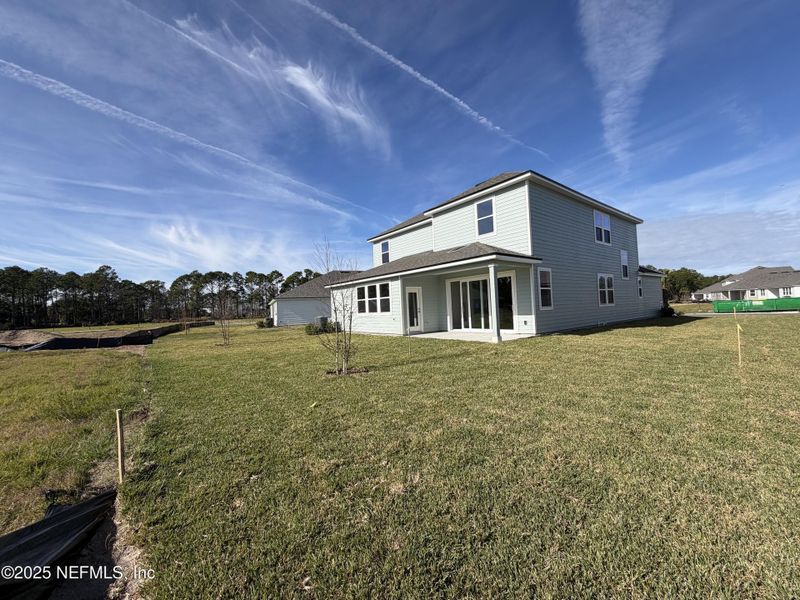 Exterior details and patio area of a home in , Flagler Beach (Image 4). Exterior details and patio area of a home in , Flagler Beach (Image 4).