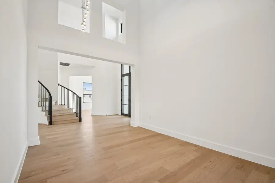 Spacious, unfurnished interior of a new home in Milky Way at River Place, Austin (Image 11).