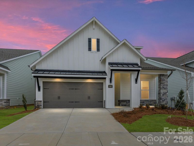 Front exterior of a new home in Encore at Streamside - Classic Series, Waxhaw, NC, highlighting curb appeal (Image 20).
