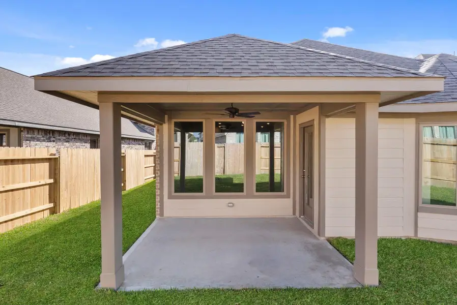 Exterior details and patio area of a home in Grand Central Park, Conroe (Image 4).