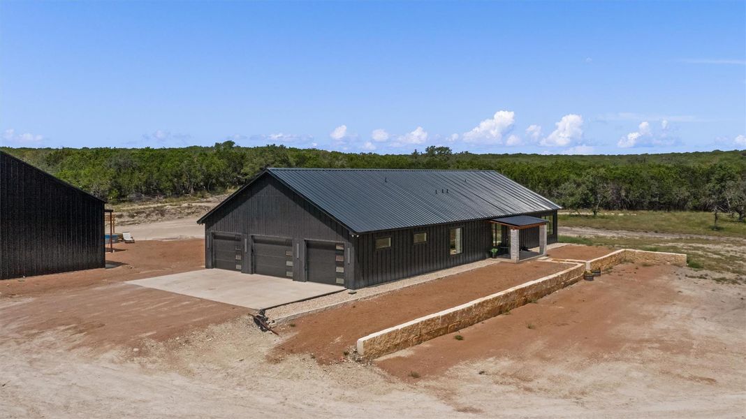 Front exterior of a new home in , Burnet, TX, highlighting curb appeal (Image 23). Front exterior of a new home in , Burnet, TX, highlighting curb appeal (Image 23).