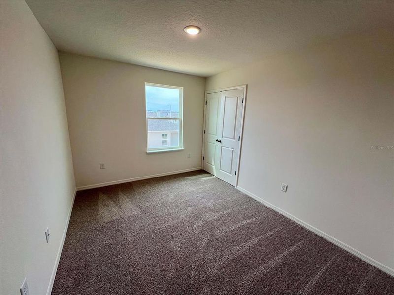 Spacious, unfurnished interior of a new home in Villamar, Winter Haven (Image 18).