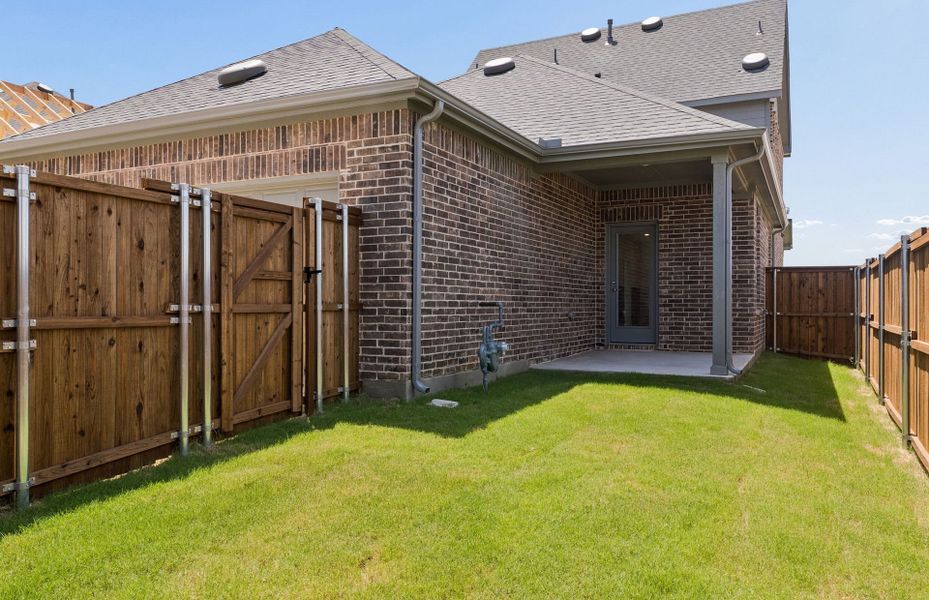 Exterior details and patio area of a home in Pinnacle at Legacy Hills, Celina (Image 3).