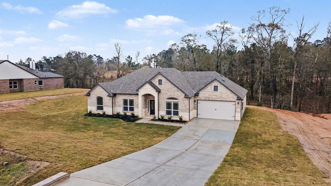 Front exterior of a new home in Rose Hill Estates, Willis, TX, highlighting curb appeal (Image 19).