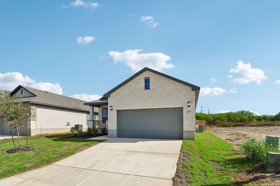 Front exterior of a new home in Royal Crest, San Antonio, TX, highlighting curb appeal (Image 24).