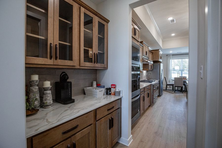 Representative furnished interior of a home built from the Willow by Grant & Co in Manor at Hall Creek, Arlington (Image 106).