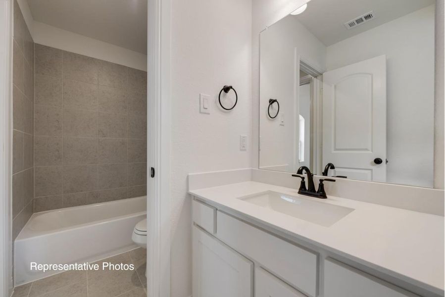 Representative furnished interior of a home built from the Grand Martinique by Grand Homes in Providence Cove, McKinney (Image 9). Representative furnished interior of a home built from the Grand Martinique by Grand Homes in Providence Cove, McKinney (Image 9).
