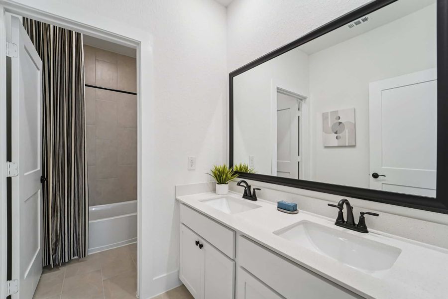 Representative furnished interior of a home built from the Versailles – Chateau Collection by Chesmar Homes in Bridgeland, Cypress (Image 13).