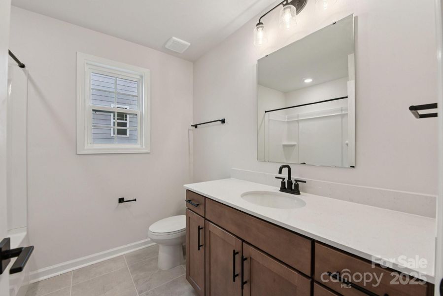 Furnished interior view inside a new home in Sylvan Creek, Denver (Image 8).