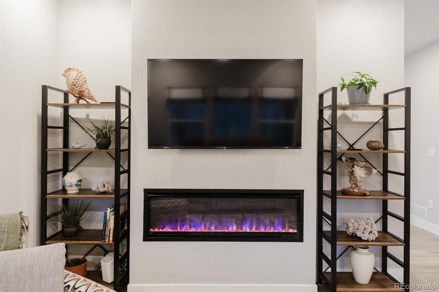 The linear gas fireplace gives the home a modern touch. The linear gas fireplace gives the home a modern touch.
