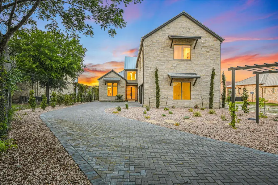 Front exterior of a new home in , Horseshoe Bay, TX, highlighting curb appeal (Image 1).