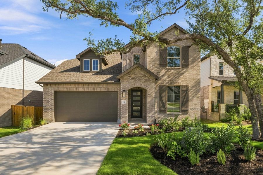 Front exterior of a new home in Parkside On The River, Georgetown, TX, highlighting curb appeal (Image 1). Front exterior of a new home in Parkside On The River, Georgetown, TX, highlighting curb appeal (Image 1).