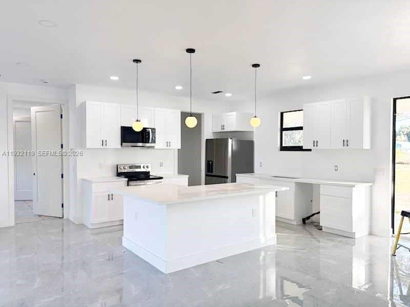 Furnished interior view inside a new home in , Clewiston (Image 15).