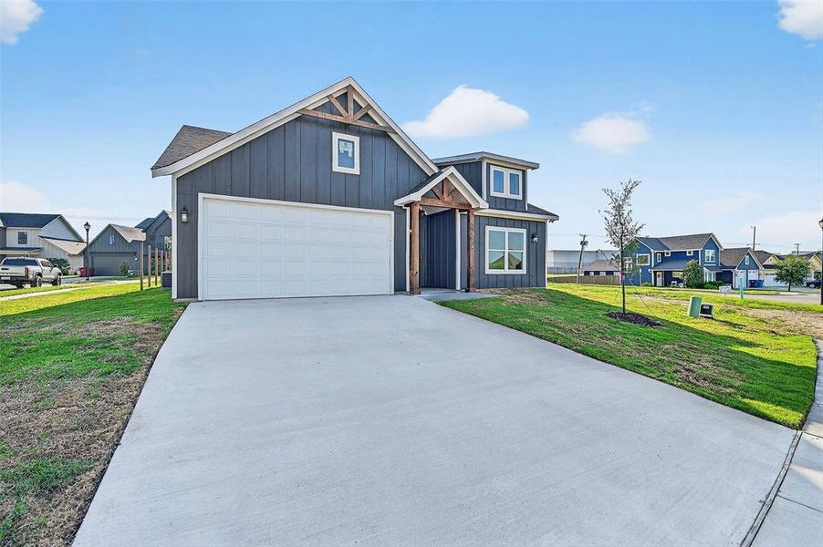 Front exterior of a new home in , Sherman, TX, highlighting curb appeal (Image 21).