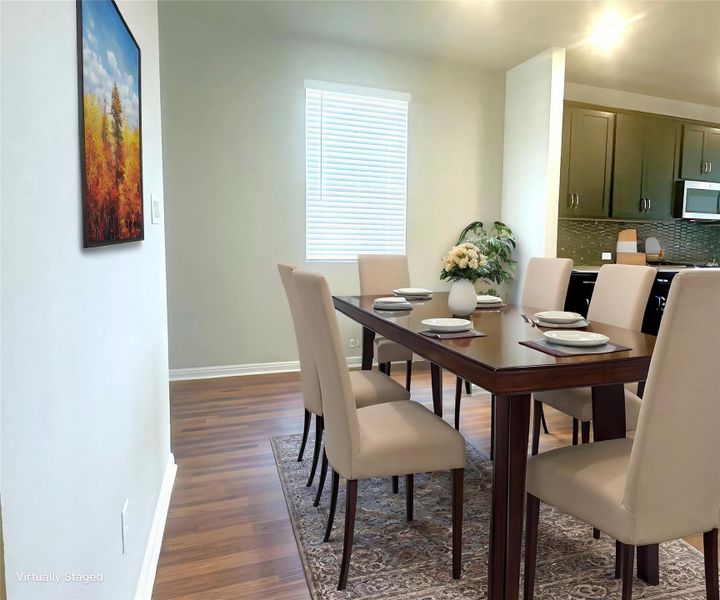 Dining area with baseboards and LVP floors Dining area with baseboards and LVP floors