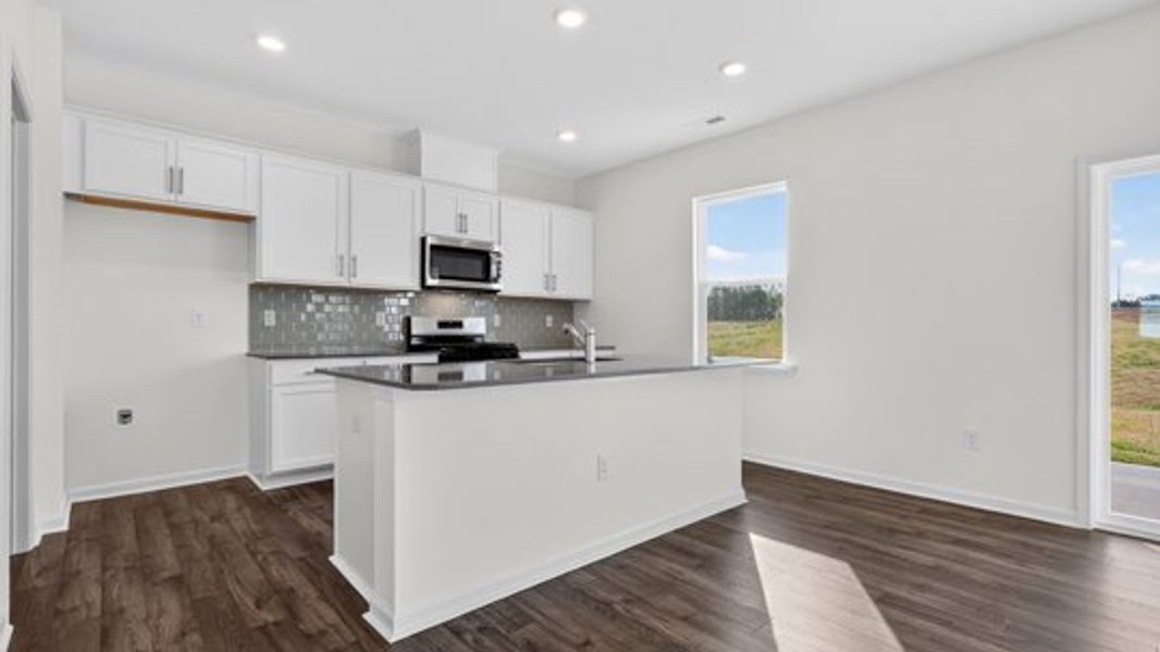 Furnished interior view inside a new home in The Reserve at Prestleigh, Wake Forest (Image 5).