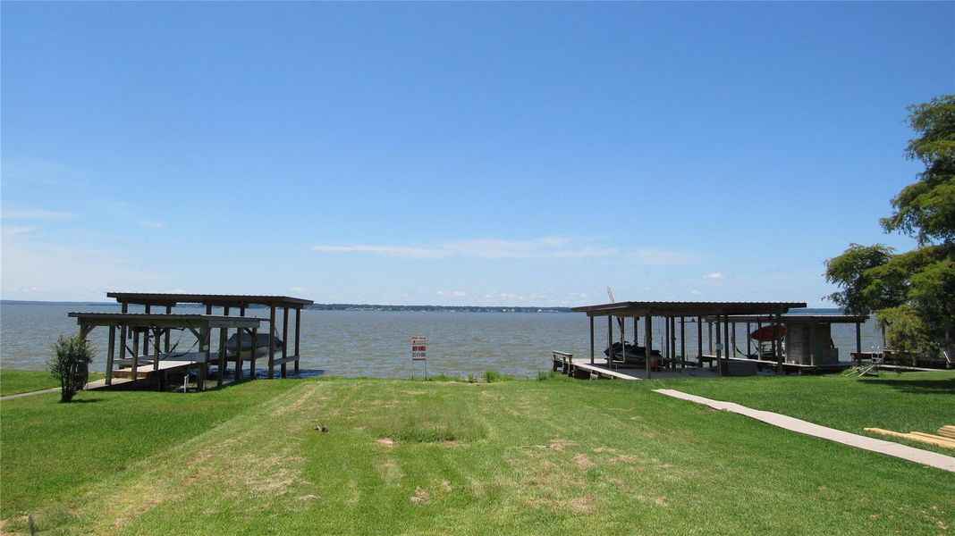 Experience serene lakefront living with stunning views of Lake Livingston right from your backyard.