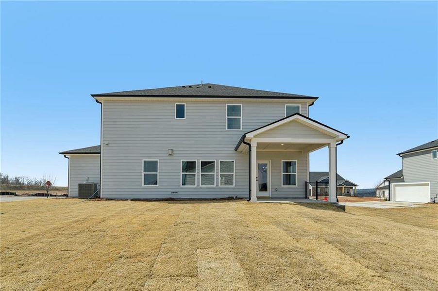 Exterior details and patio area of a home in River Pointe, Monroe (Image 34).