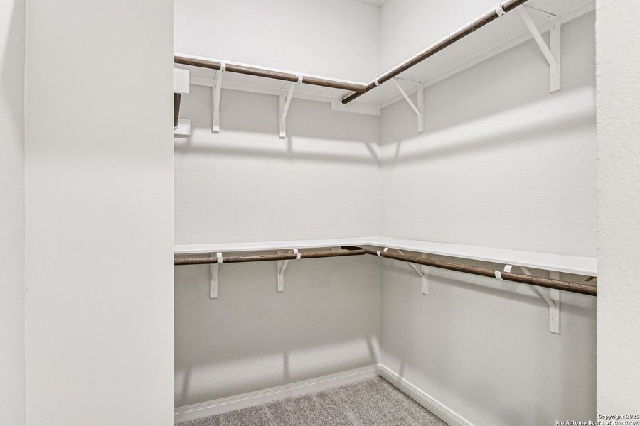 Spacious, unfurnished interior of a new home in Magnolia Village North, San Antonio (Image 32).