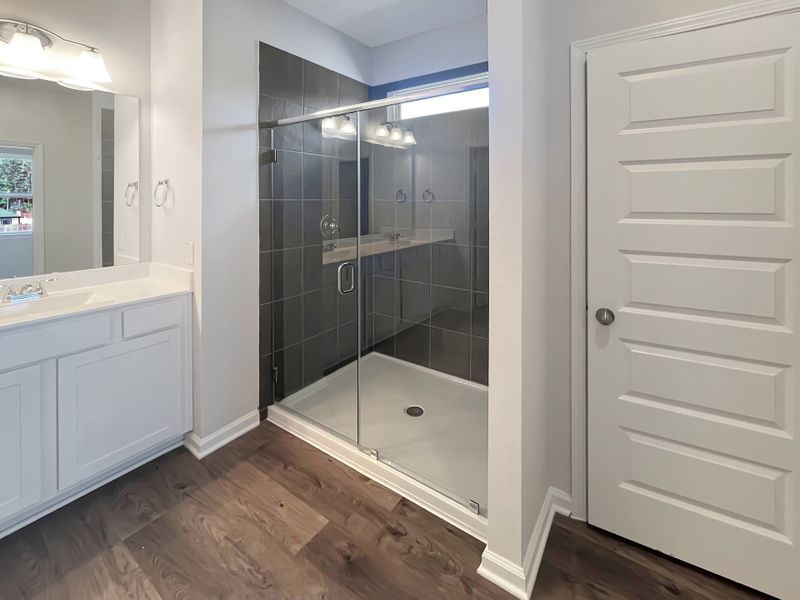 The Oriole II- Owner's Bathroom with Walk-in Shower and Dual Sinks