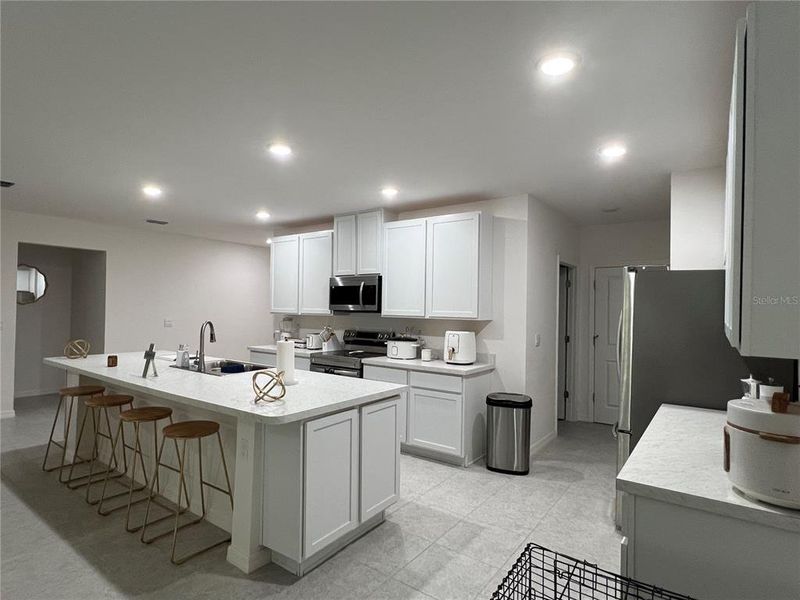 Furnished interior view inside a new home in , North Port (Image 19).