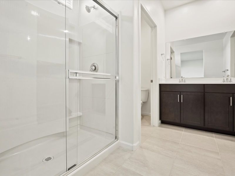 Front exterior of a new home in Alamar at Rocking K, Tucson, AZ, highlighting curb appeal (Image 1).