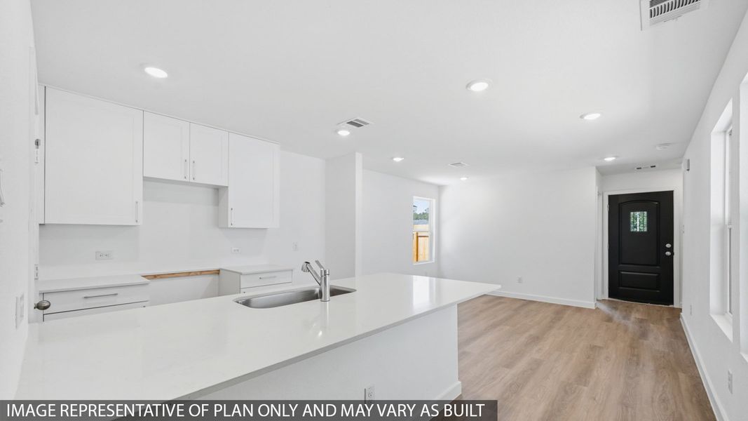 Furnished interior view inside a new home in Baron Village, Conroe (Image 8).
