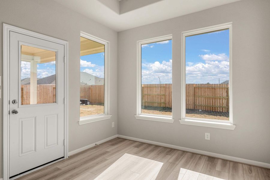 Dining room. Note: Sample product photo - actual exterior and interior selections may vary by homesite