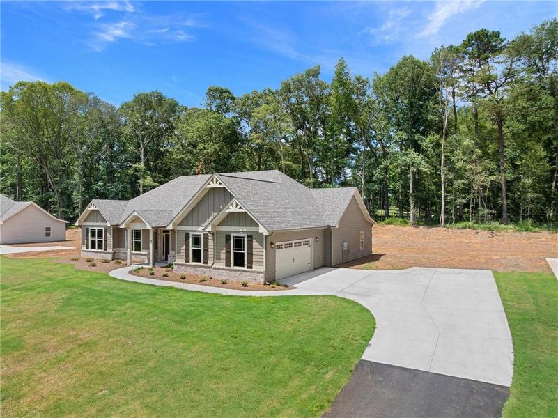 Front exterior of a new home in , Jefferson, GA, highlighting curb appeal (Image 2).
