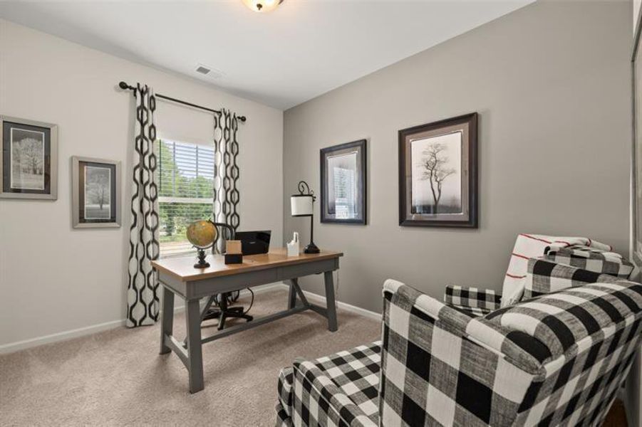 Furnished interior view inside a new home in Jameson Towns, Villa Rica (Image 29).