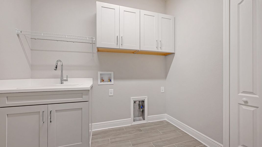 Furnished interior view inside a new home in Boca Royale Golf and Country Club at Wellen Park, Englewood (Image 16).