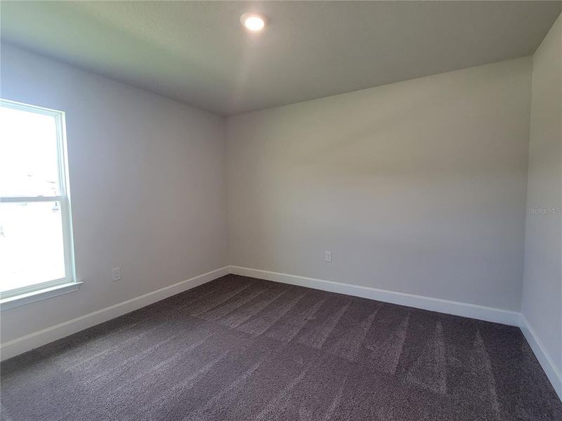 Spacious, unfurnished interior of a new home in Abbey Glen, Dade City (Image 18).