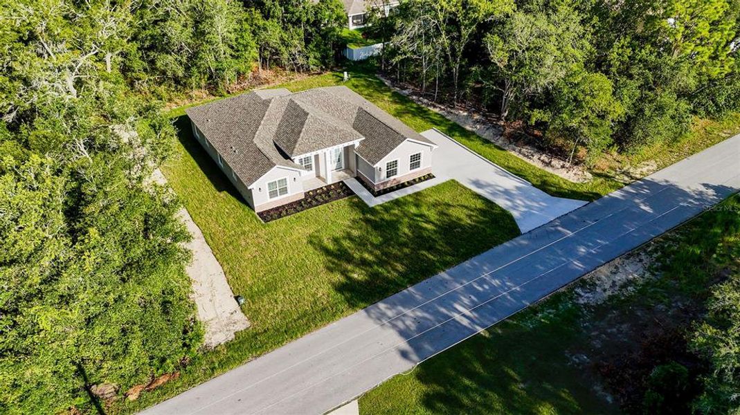Front exterior of a new home in , Summerfield, FL, highlighting curb appeal (Image 20). Front exterior of a new home in , Summerfield, FL, highlighting curb appeal (Image 20).