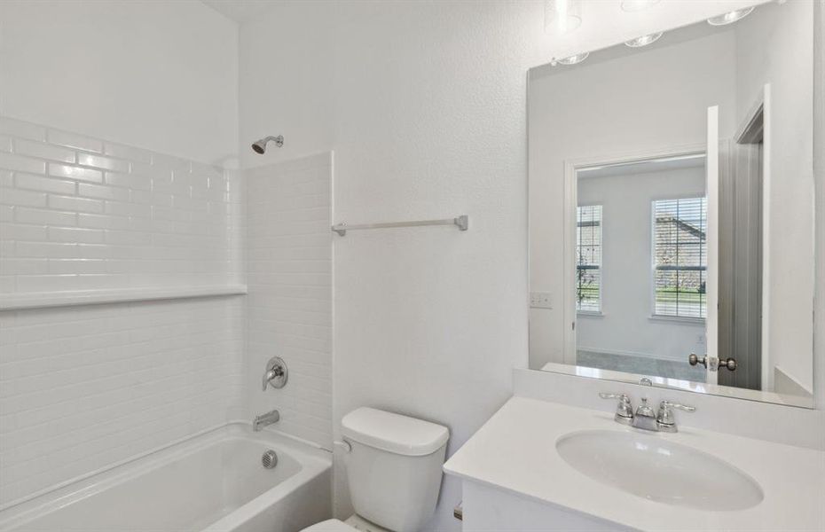 Spacious secondary bathroom*real home pictured