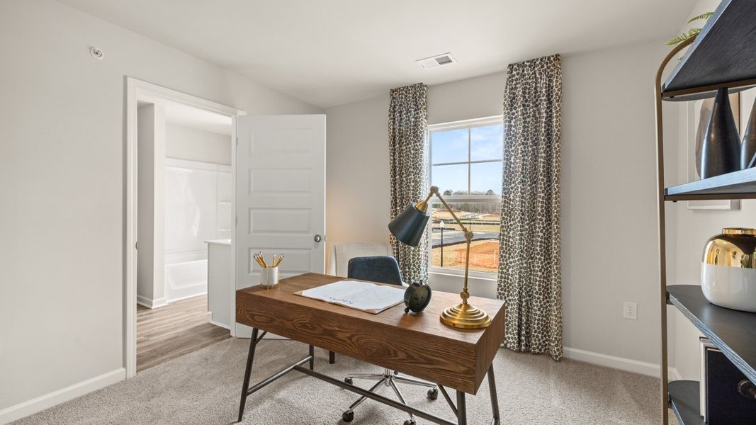Representative furnished interior of a home built from the Stratford by D.R. Horton in Echo Glen, Stockbridge (Image 27).