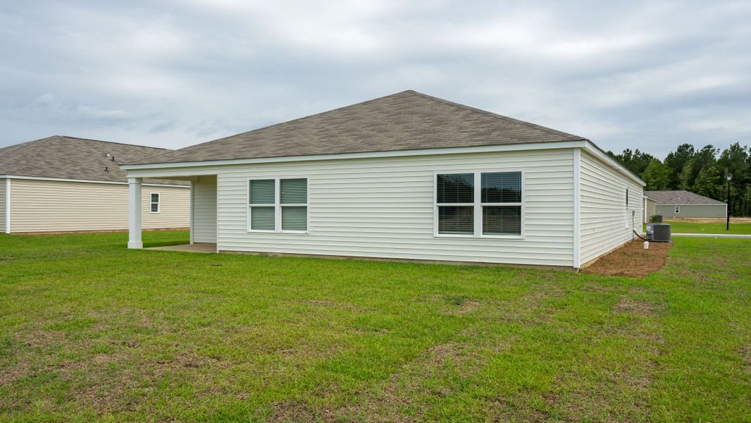 Exterior details and patio area of a home in Cottonwood Place, Tabor City (Image 3). Exterior details and patio area of a home in Cottonwood Place, Tabor City (Image 3).