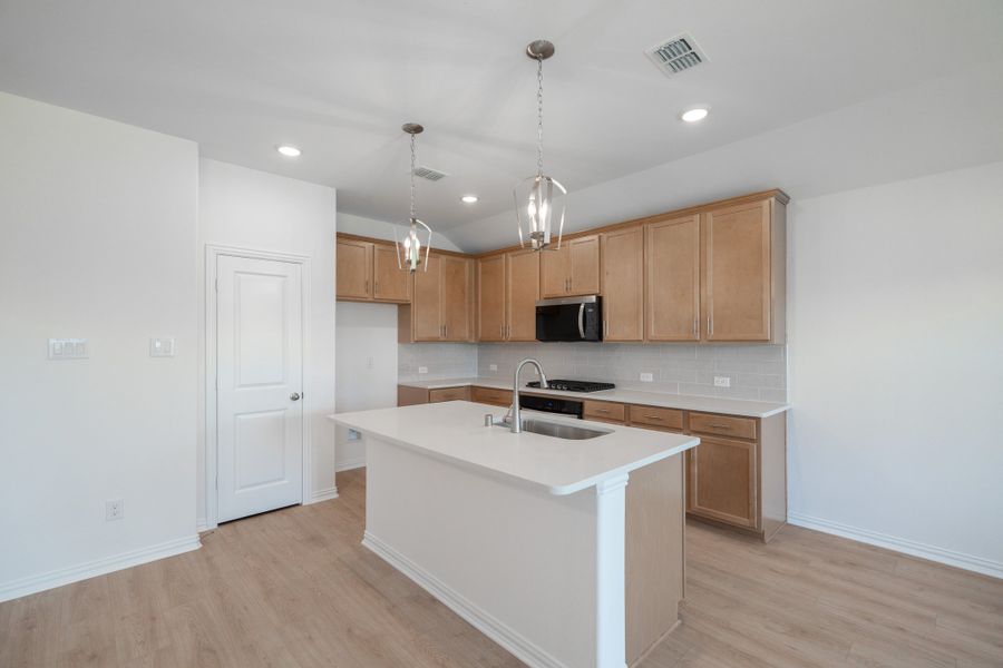 Furnished interior view inside a new home in Lake Pointe, Little Elm (Image 7).