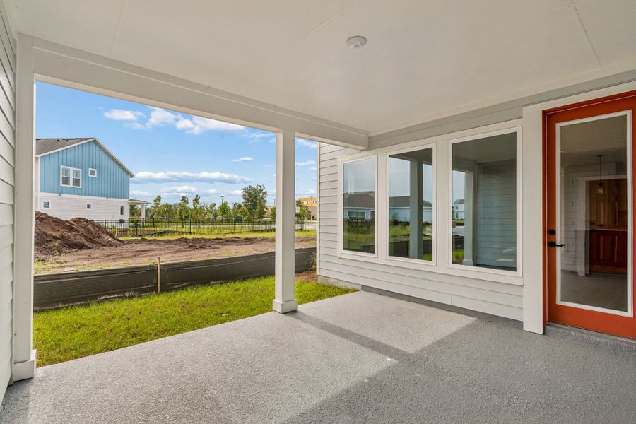 Exterior details and patio area of a home in Weslyn Park in Sunbridge 34', St. Cloud (Image 3).