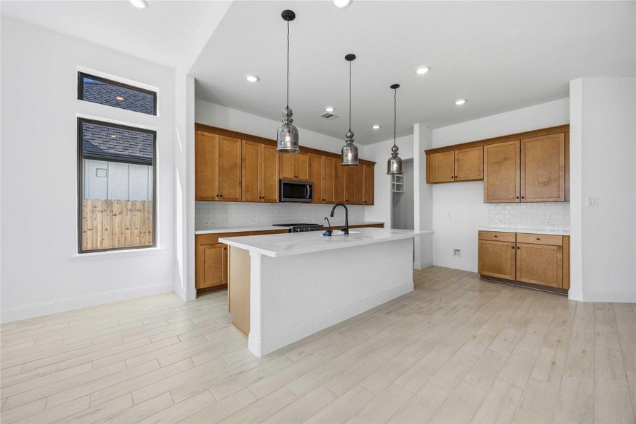 Furnished interior view inside a new home in Sienna, Missouri City (Image 11).