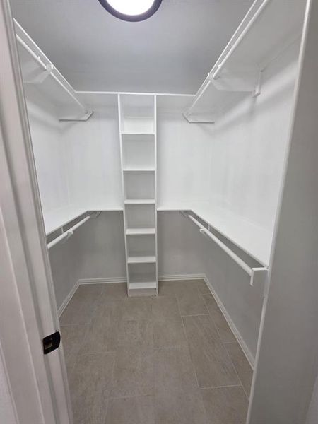 View of walk in closet View of walk in closet