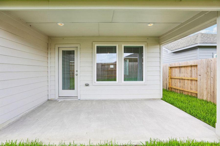 Exterior details and patio area of a home in Riviera Pines - Traditional Series, Conroe (Image 20).