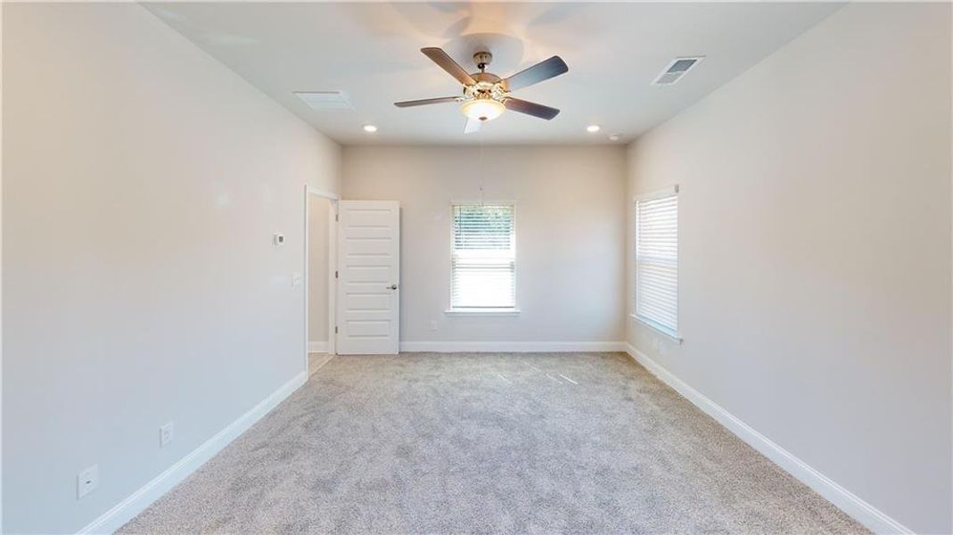 Spacious, unfurnished interior of a new home in Holliday Pass, Griffin (Image 30).