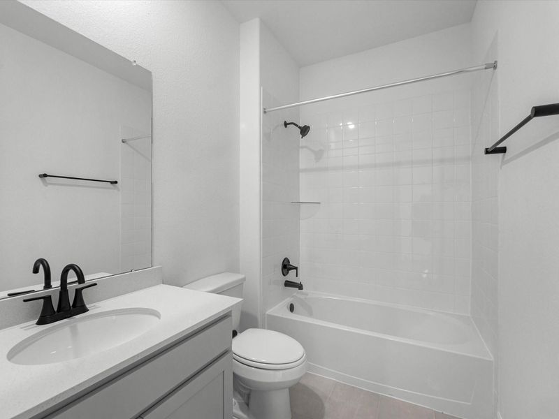 Furnished interior view inside a new home in Sunterra Lakes, Brookshire (Image 7).